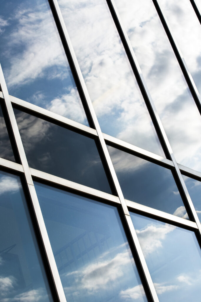 Kush jemi ne 1 low angle building with large windows